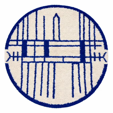 Tapis rond berbère Tudert bleu aux motifs géométriques — tapis berbères contemporains