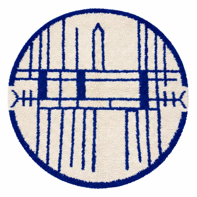 Tapis rond berbère Tudert bleu aux motifs géométriques — tapis berbères contemporains